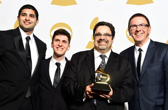 Pictuere of VINCE CHERICO winning A GRAMMY WITH ARTURO O’FARRILL